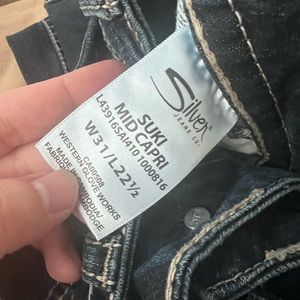 Size 31 waist Silver Capris.